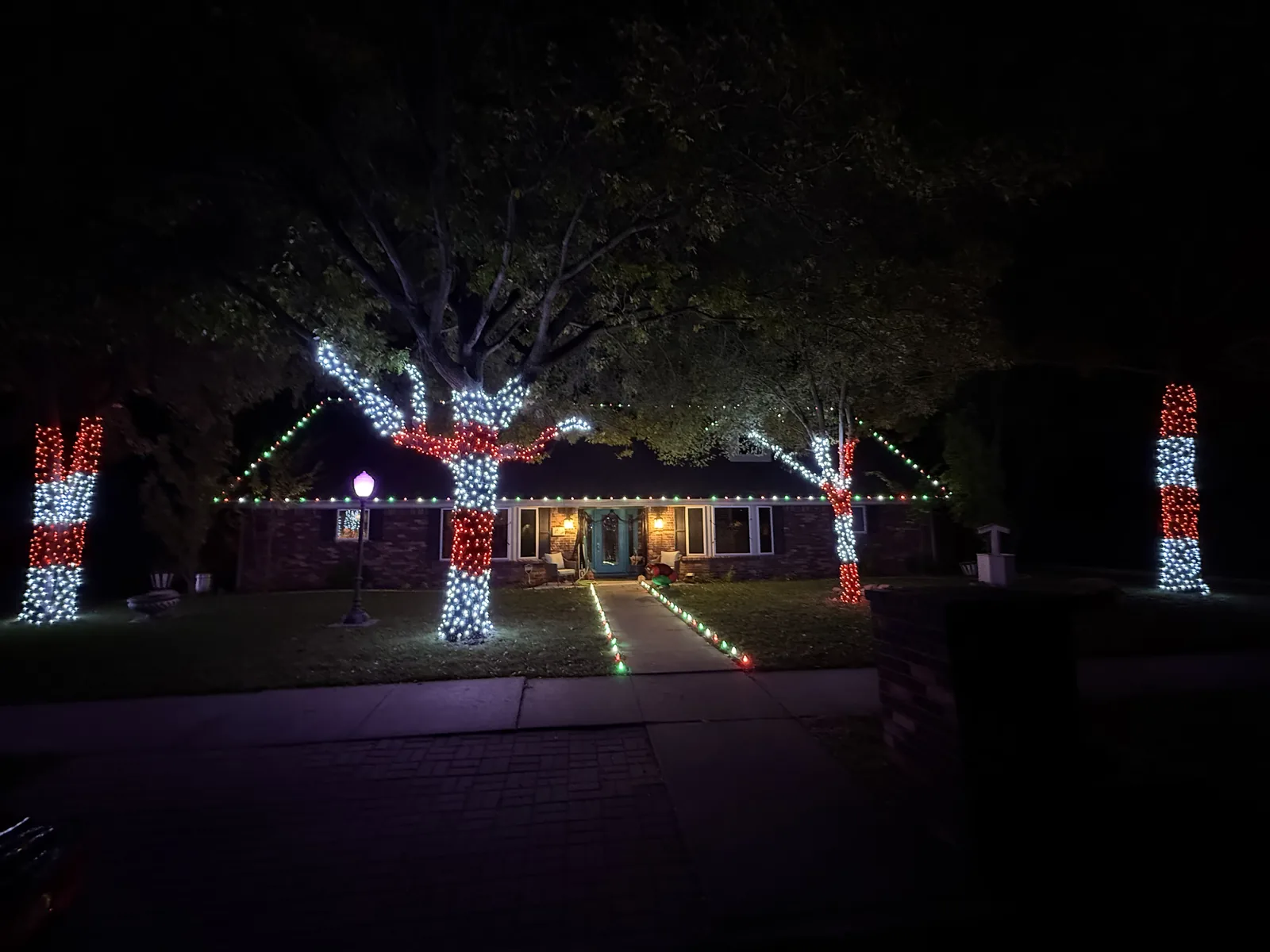T'n D Christmas light install — multi-story home